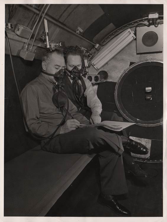 E.C. McLeod (L) In Lockheed Hypobaric Chamber, Ca. 1942
